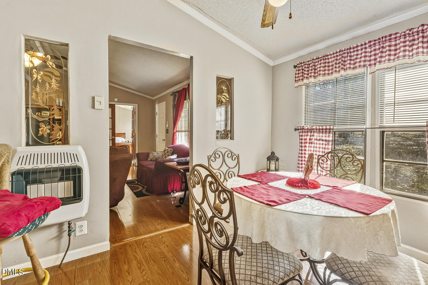3663 Chewning Road Oxford, NC 27565 - Photo 16 of 43 a dining room with furniture and window