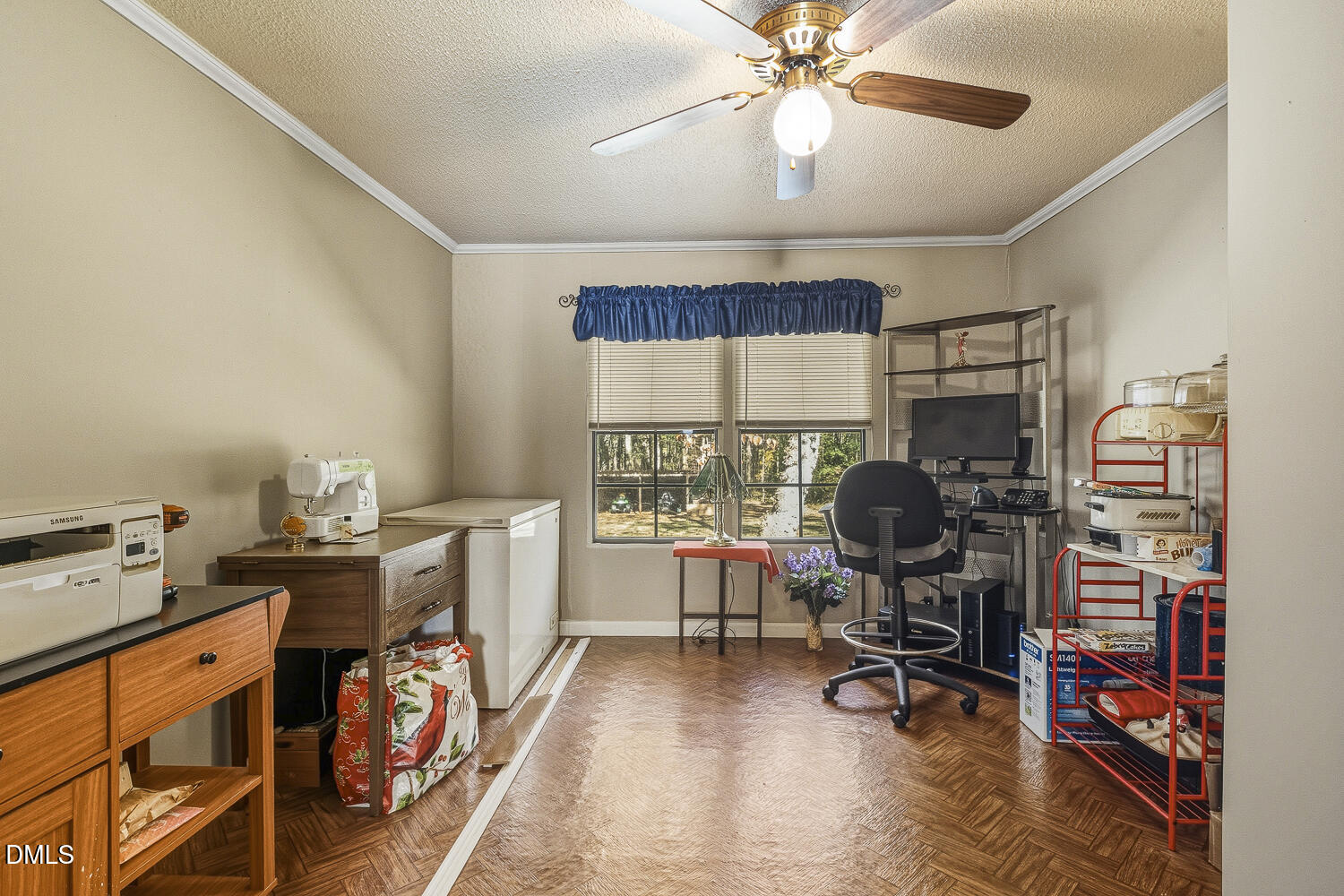 3663 Chewning Road Oxford, NC 27565 - Photo 22 of 43 a view of a workspace with furniture and a window