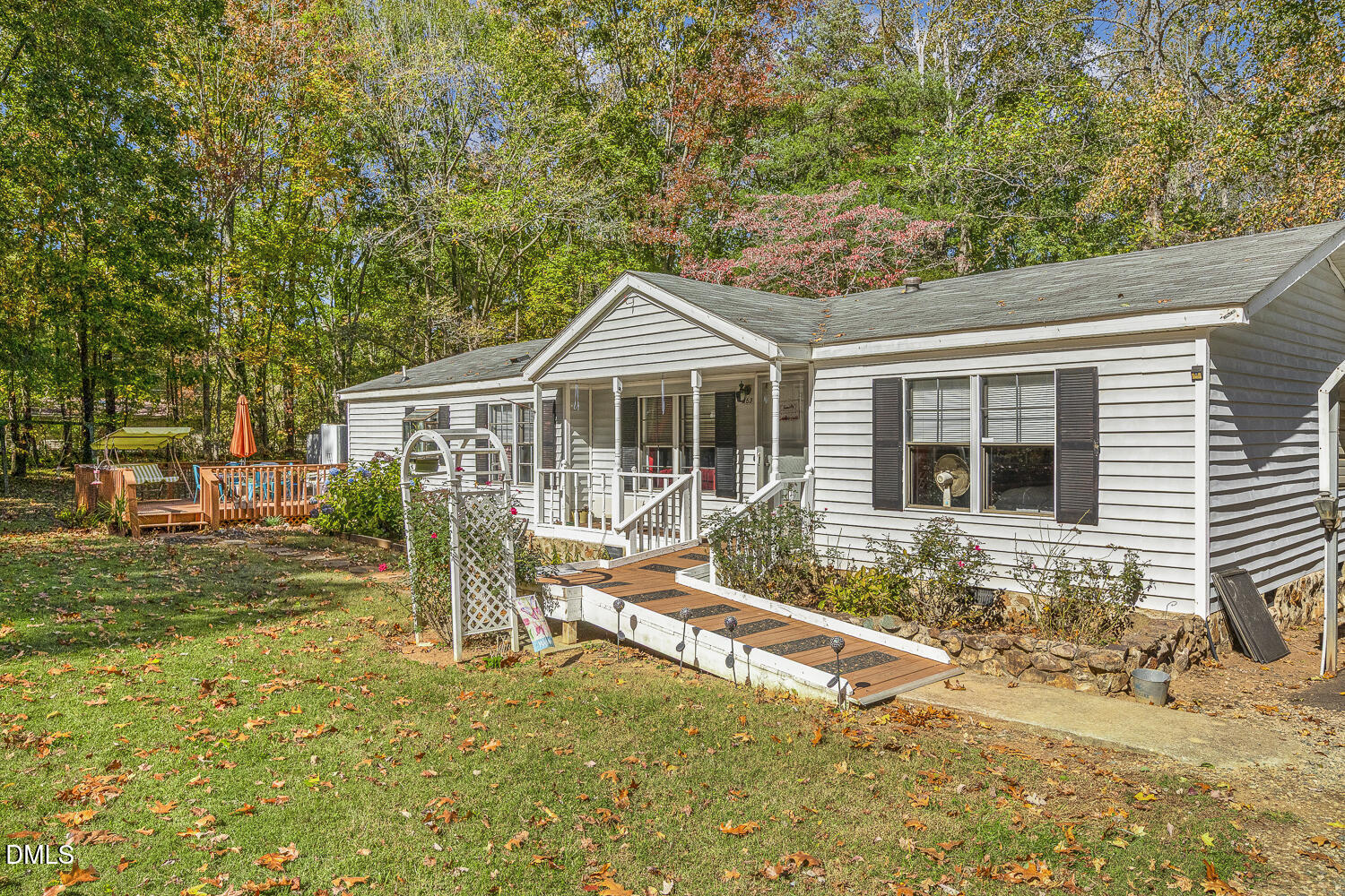 3663 Chewning Road Oxford, NC 27565 - Photo 3 of 43 a house with swimming pool in front of it