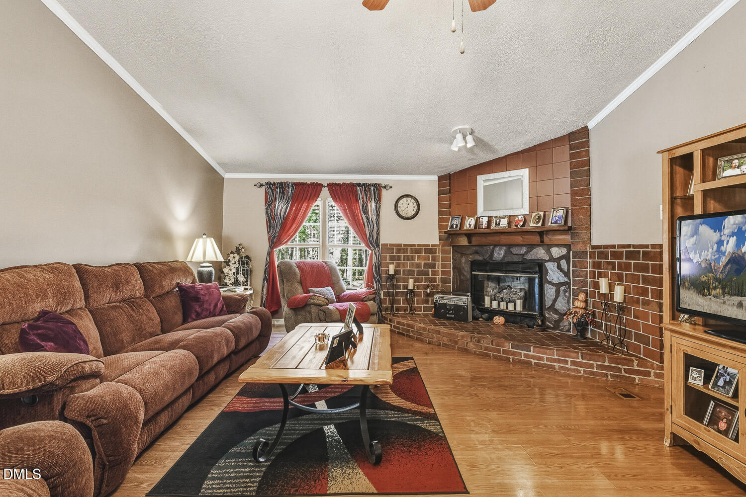 3663 Chewning Road Oxford, NC 27565 - Photo 4 of 43 a living room with furniture a piano and a flat screen tv