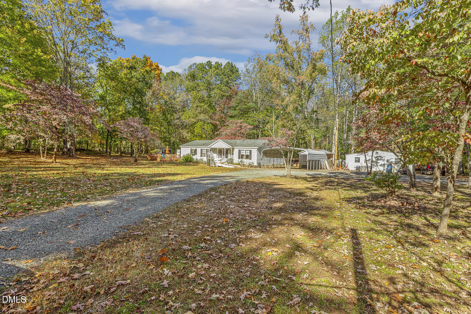 3663 Chewning Road Oxford, NC 27565 - Photo 43 of 43 a view of a house with a yard and sitting area