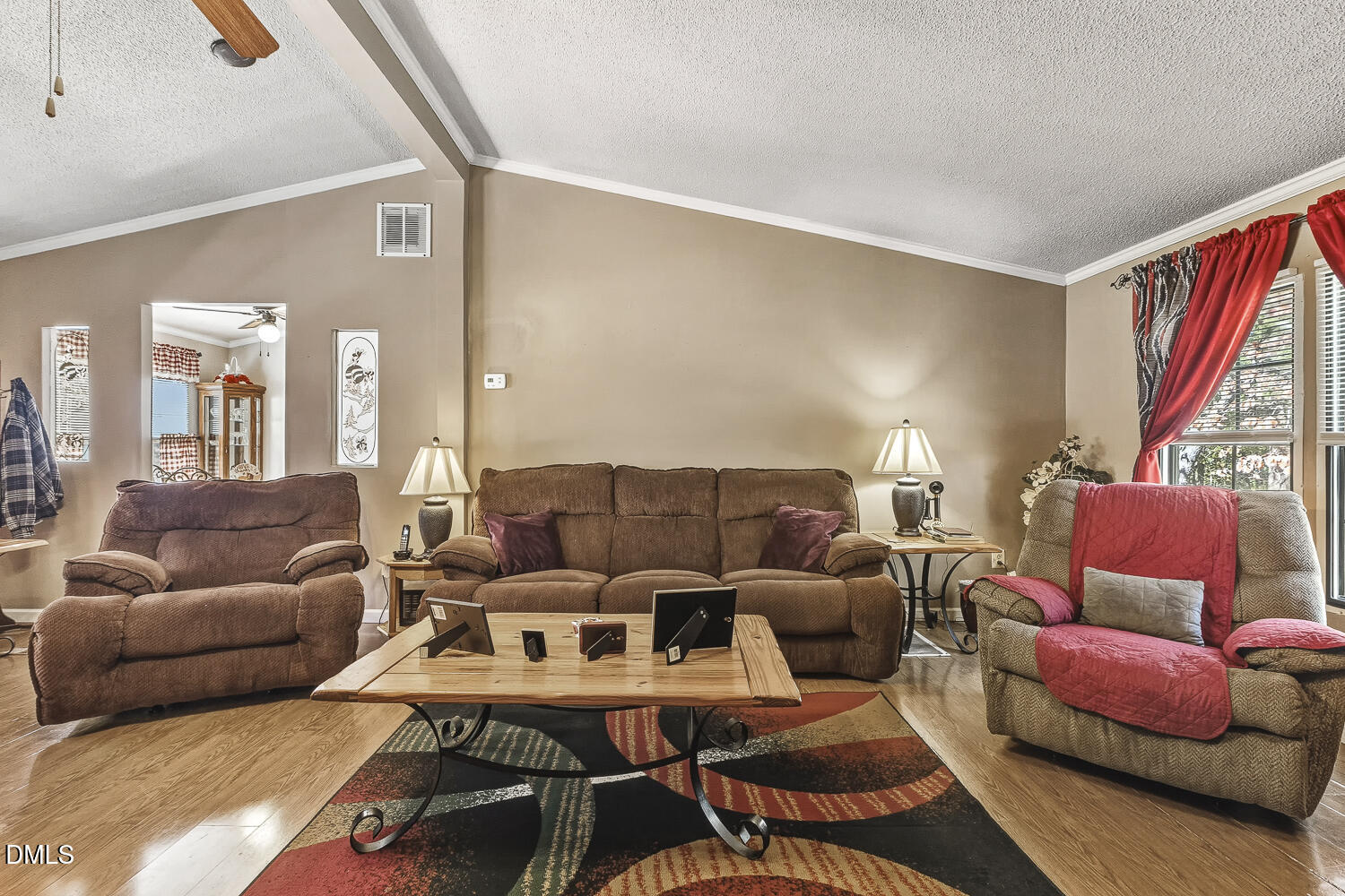 3663 Chewning Road Oxford, NC 27565 - Photo 6 of 43 a living room with furniture a rug and a large window