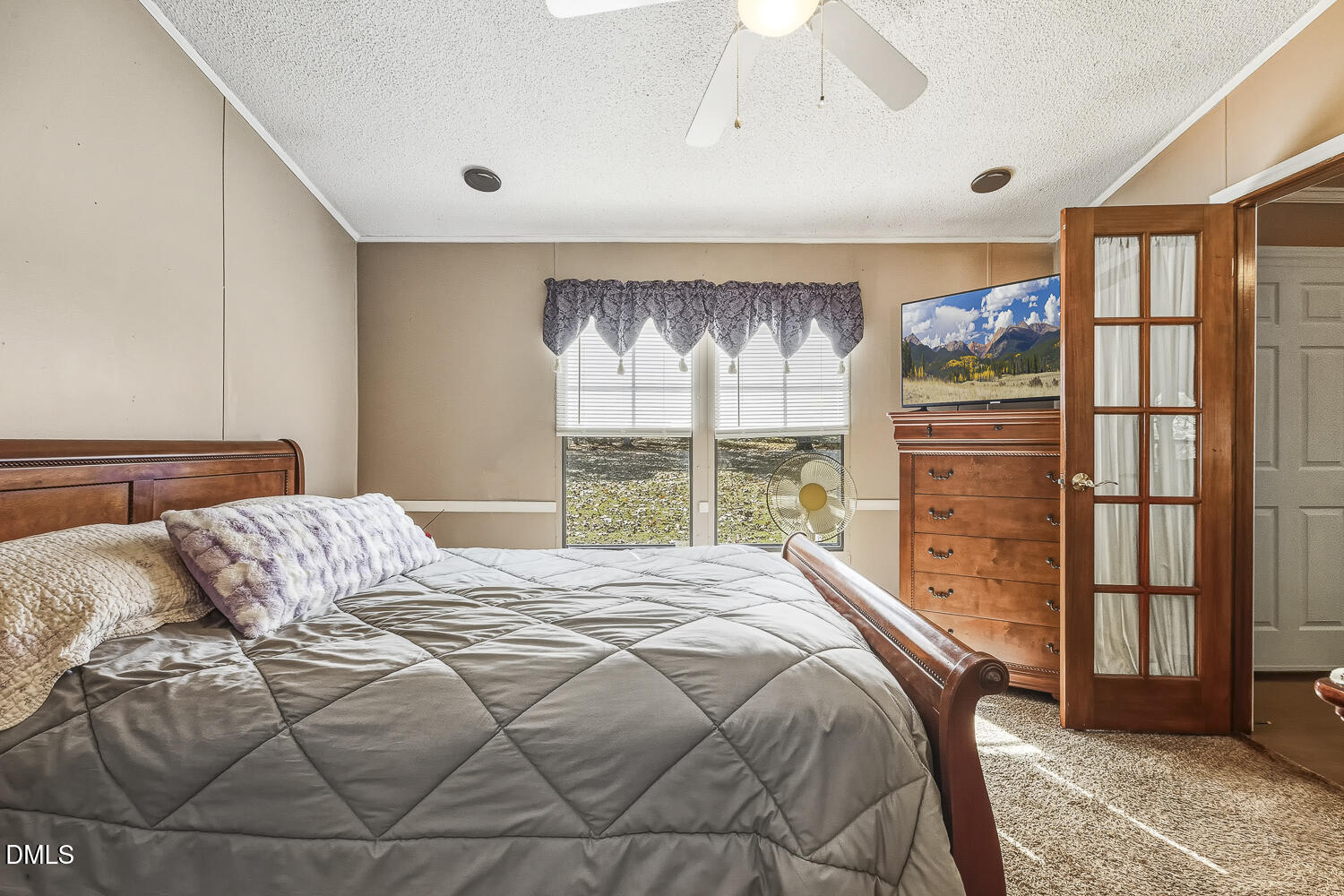 3663 Chewning Road Oxford, NC 27565 - Photo 10 of 43 a bedroom with a bed and a large window
