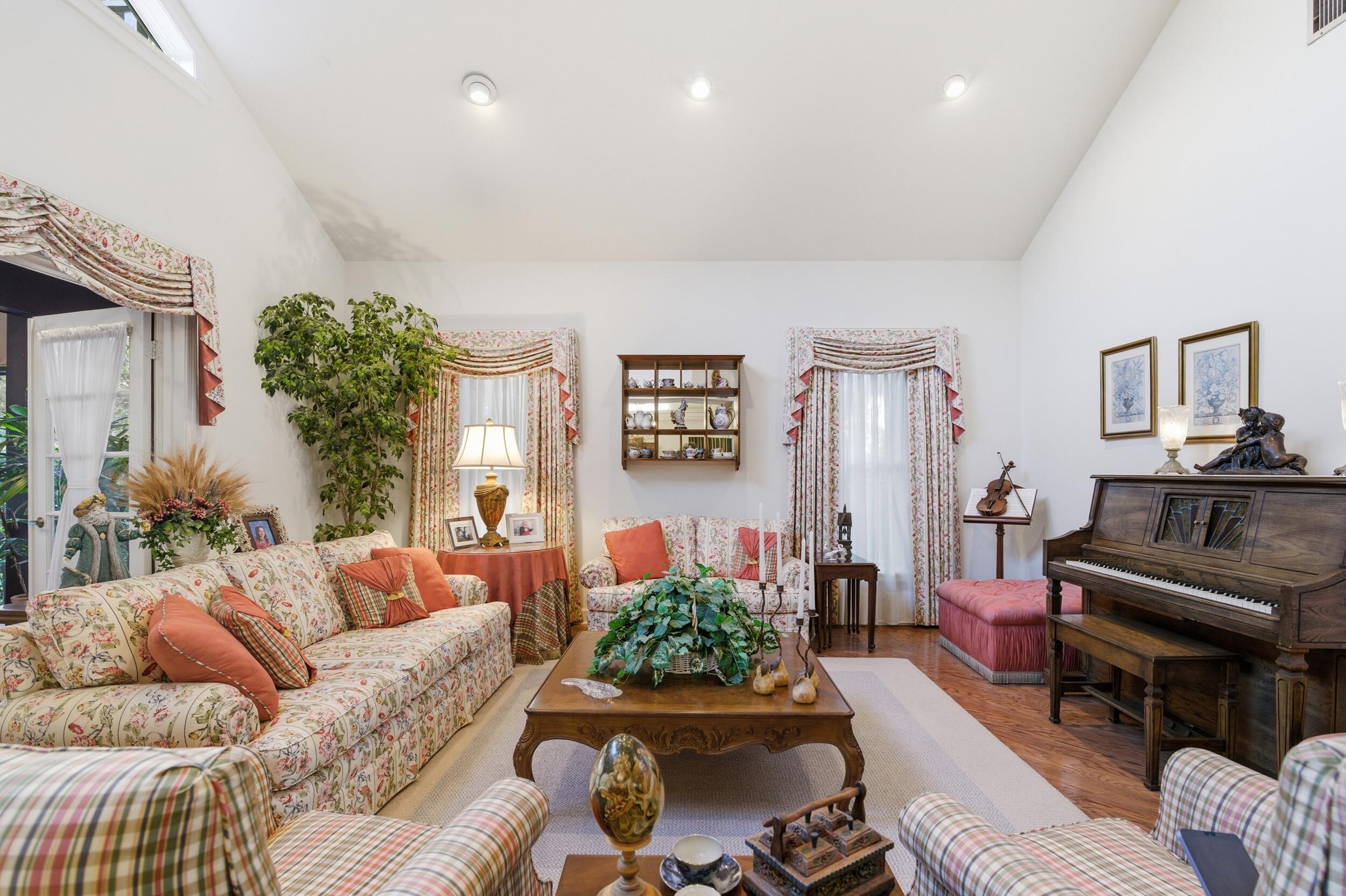 4838 Charlton Way Delray Beach, FL 33484 - Photo 16 of 74 a living room with furniture and a flat screen tv