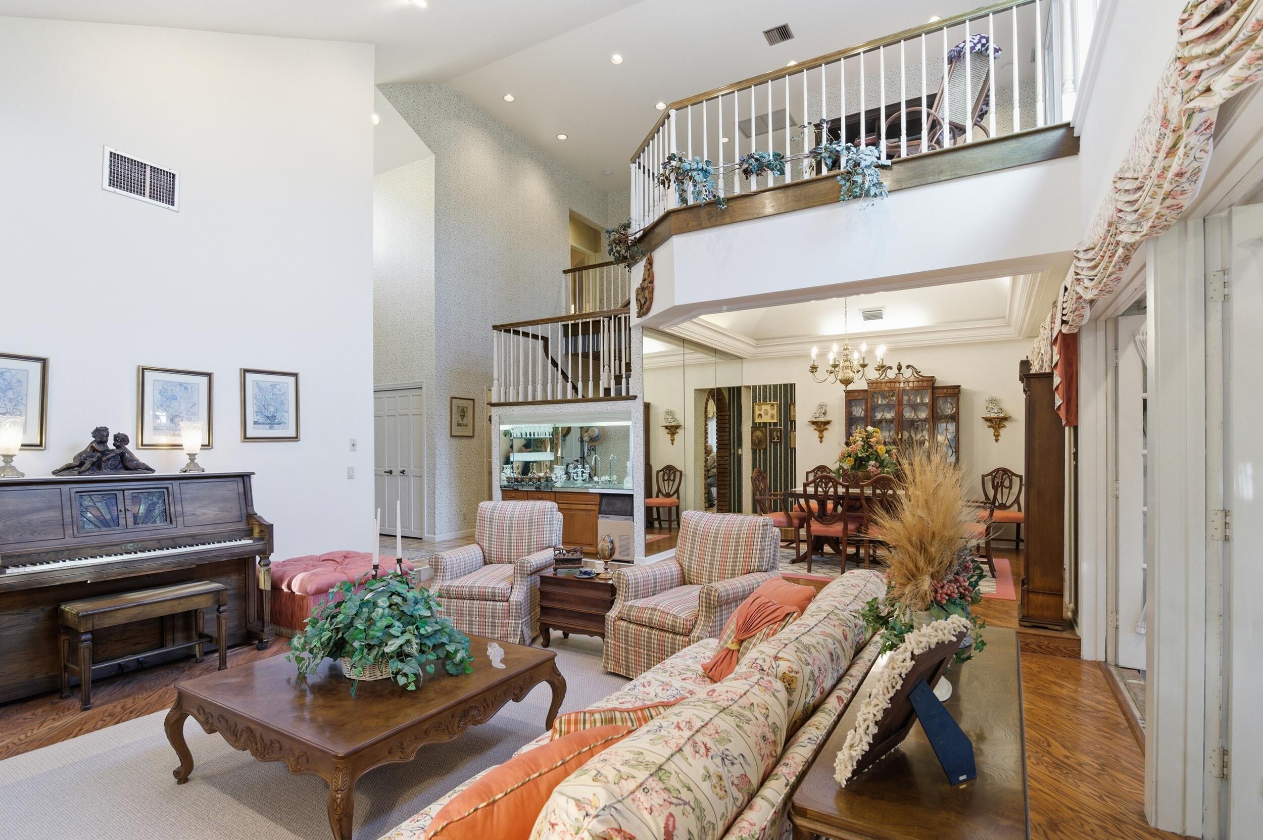 4838 Charlton Way Delray Beach, FL 33484 - Photo 18 of 74 a living room with furniture and a fireplace