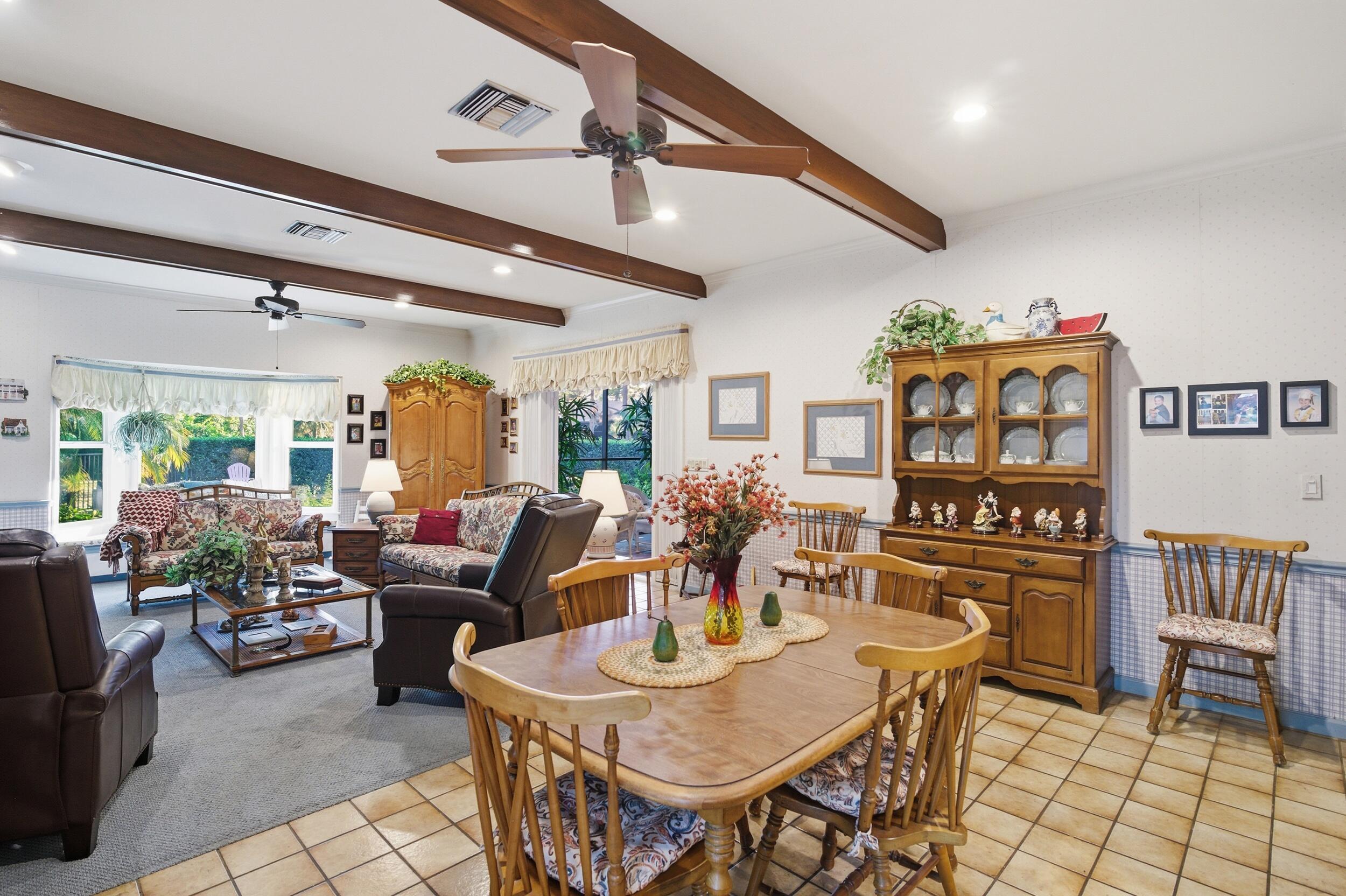4838 Charlton Way Delray Beach, FL 33484 - Photo 23 of 74 a view of a dining room with furniture
