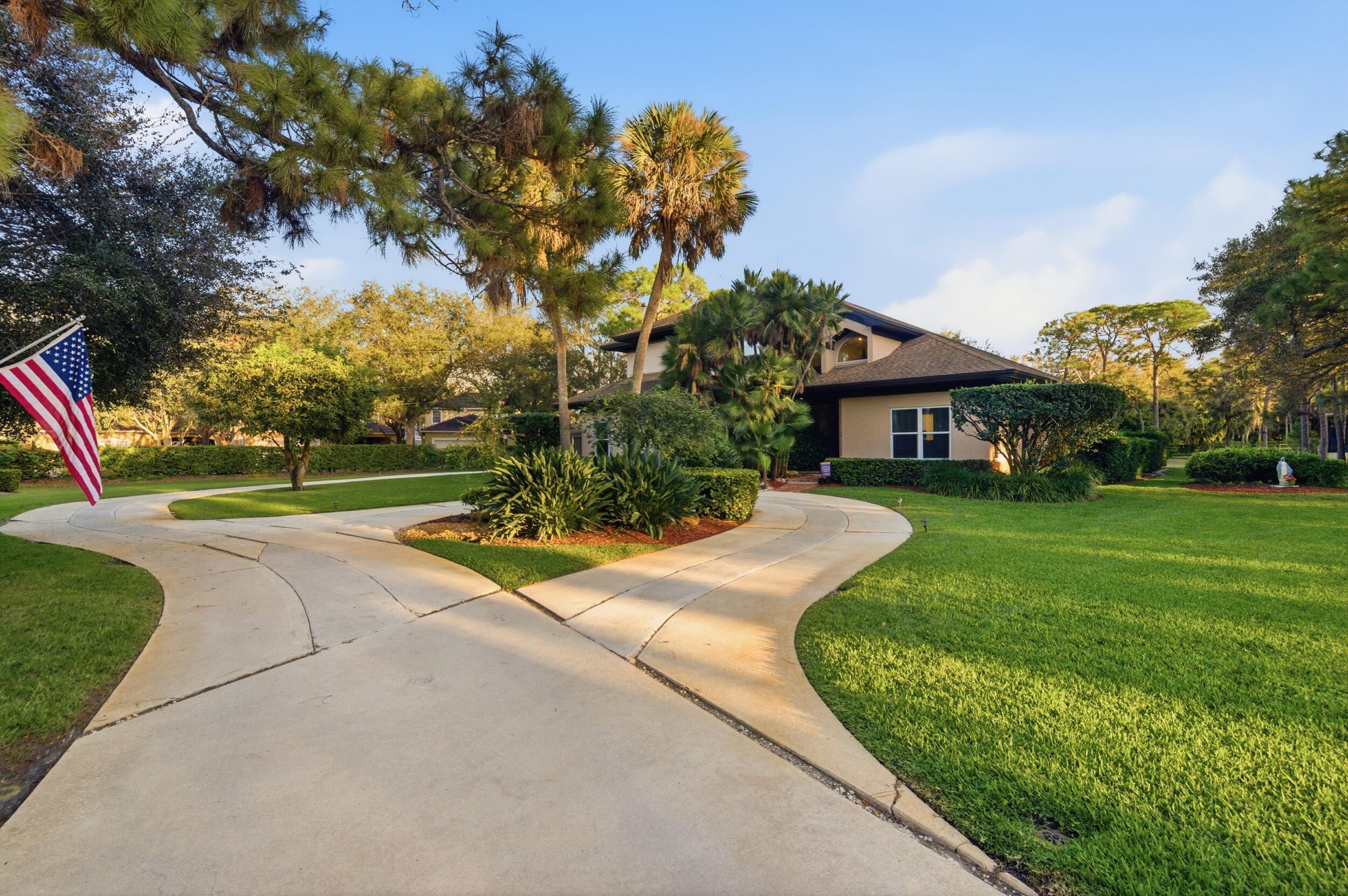 4838 Charlton Way Delray Beach, FL 33484 - Photo 4 of 74 a view of a house with a yard