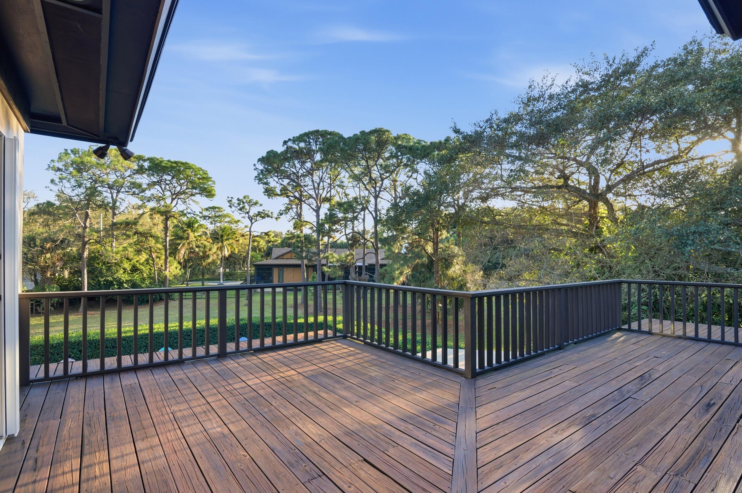 4838 Charlton Way Delray Beach, FL 33484 - Photo 42 of 74 a view of deck with wooden floor and outdoor space