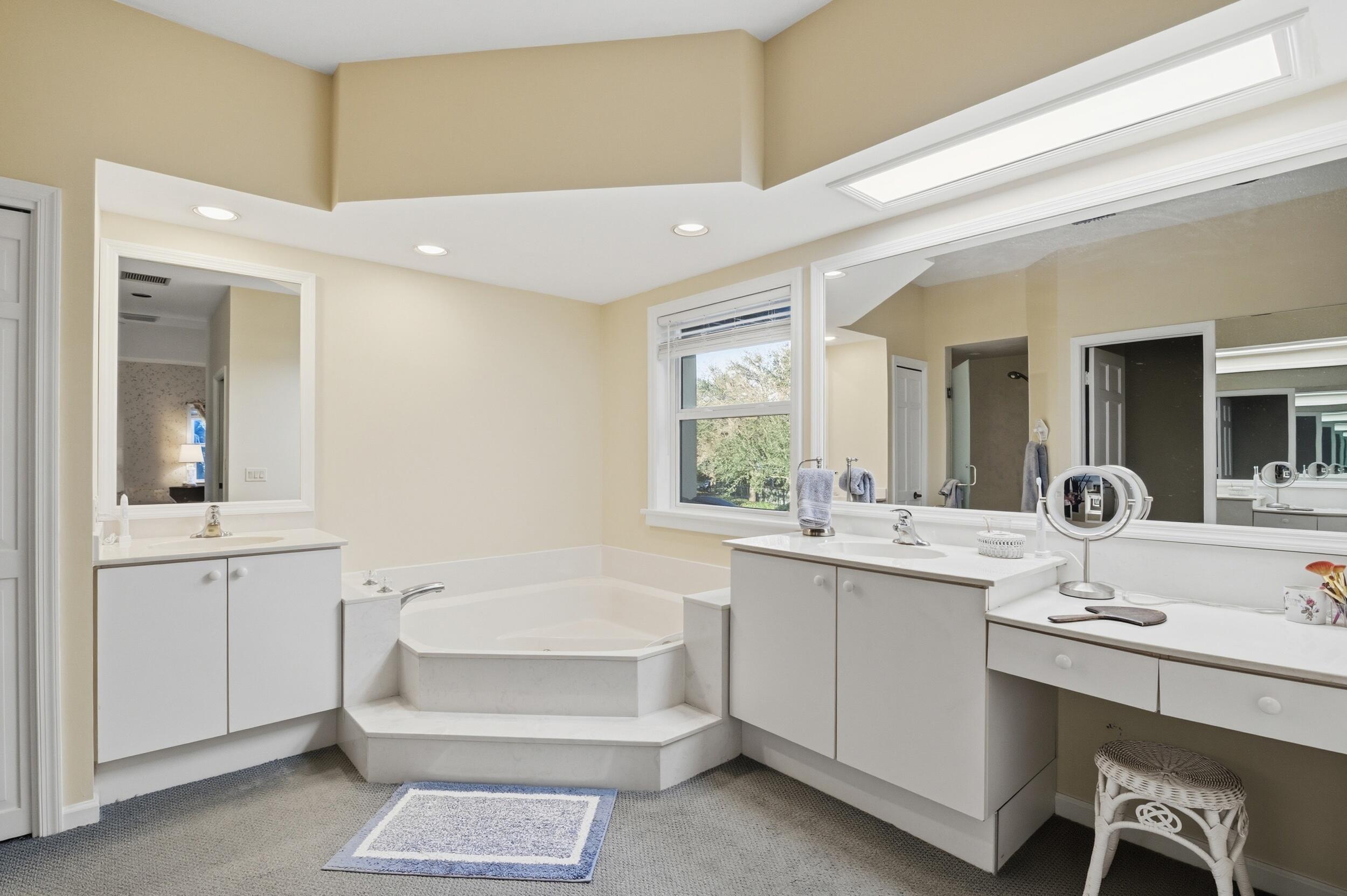 4838 Charlton Way Delray Beach, FL 33484 - Photo 47 of 74 a bathroom with a sink vanity and mirror