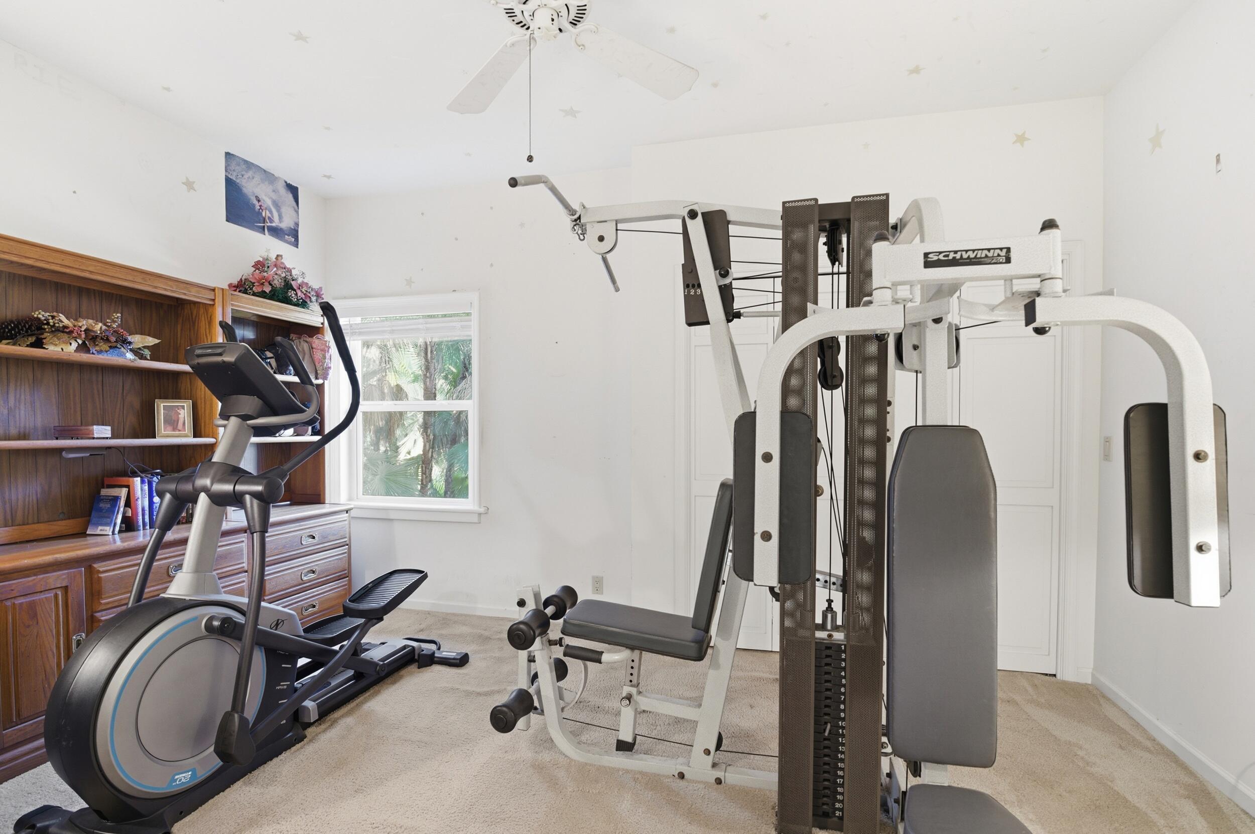 4838 Charlton Way Delray Beach, FL 33484 - Photo 51 of 74 a view of a room with gym equipment