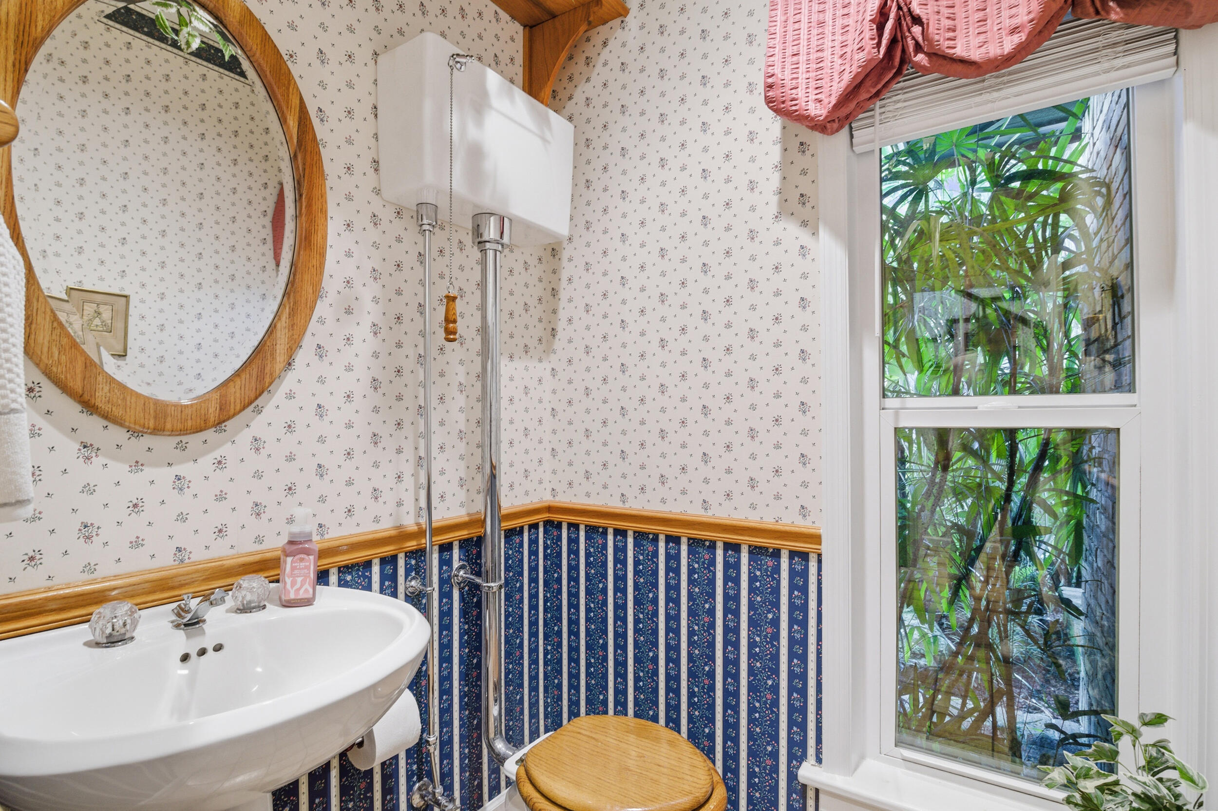 4838 Charlton Way Delray Beach, FL 33484 - Photo 52 of 74 a bathroom with a sink and a mirror