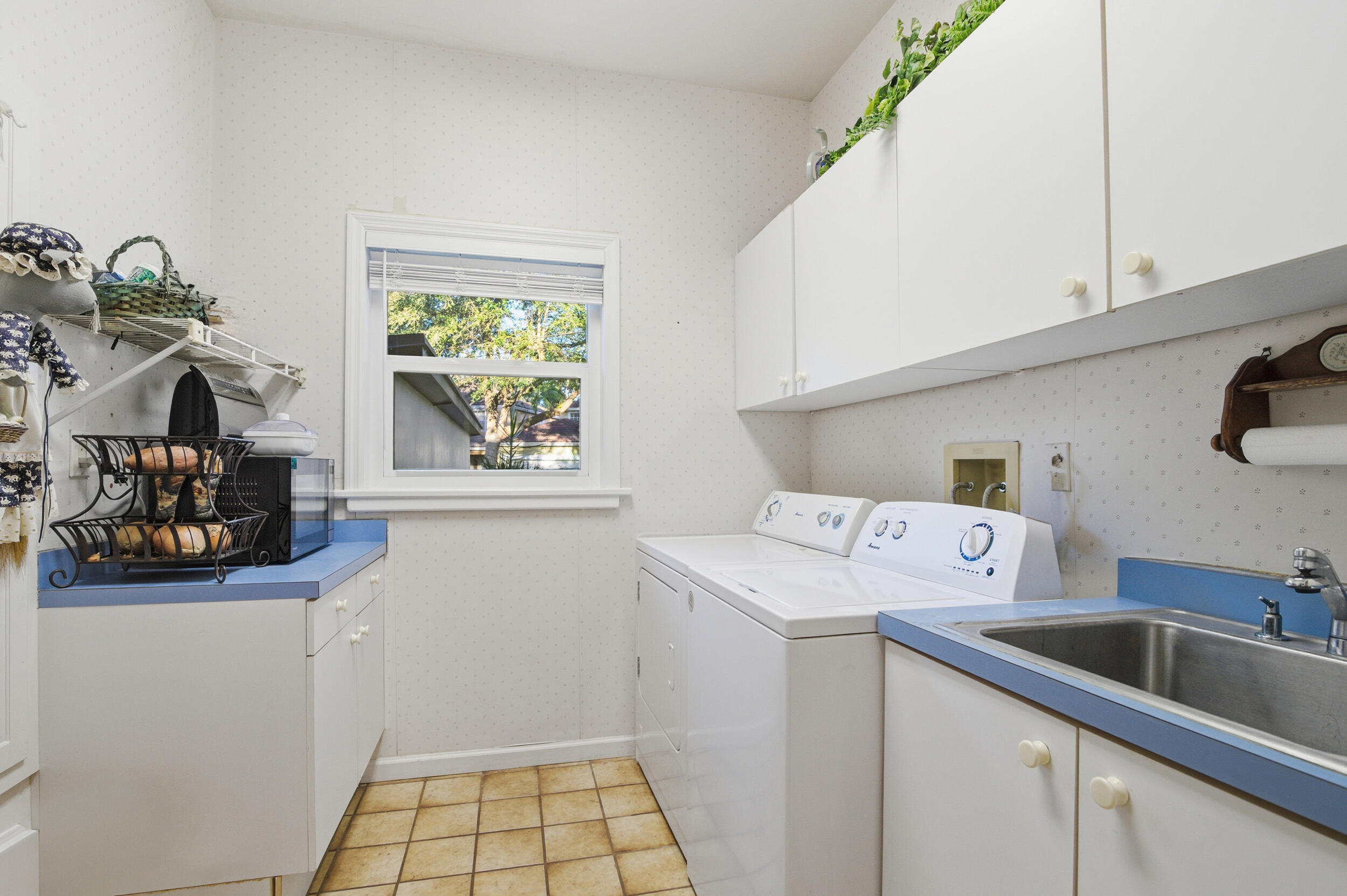 4838 Charlton Way Delray Beach, FL 33484 - Photo 53 of 74 a utility room with sink dryer and washer