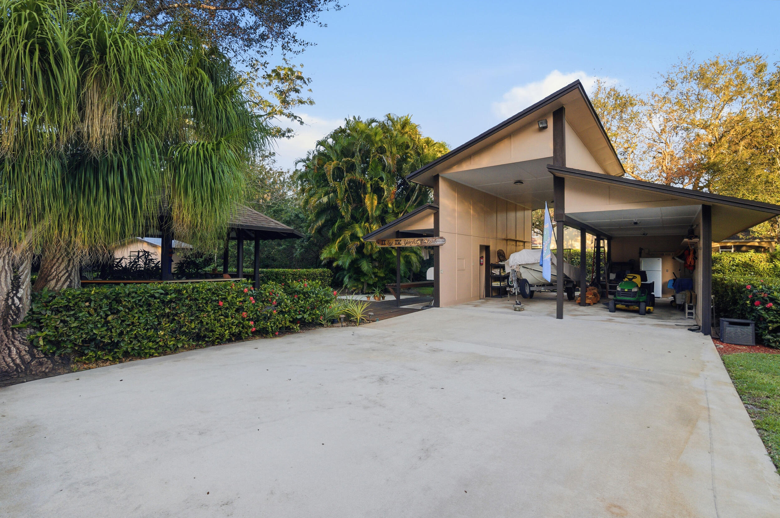 4838 Charlton Way Delray Beach, FL 33484 - Photo 67 of 74 a view of a house with backyard and sitting area