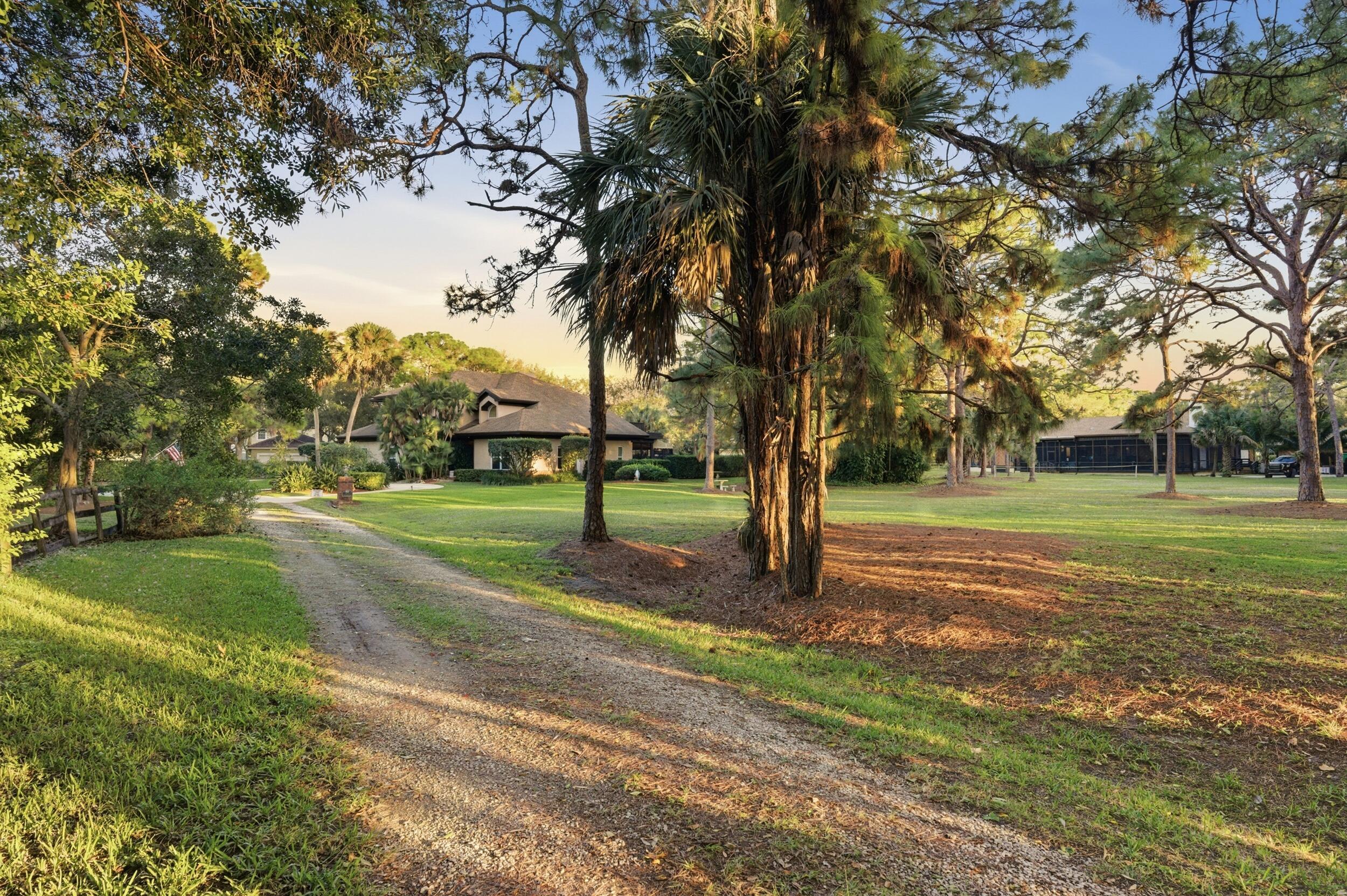 4838 Charlton Way Delray Beach, FL 33484 - Photo 73 of 74 a view of a tree in a park