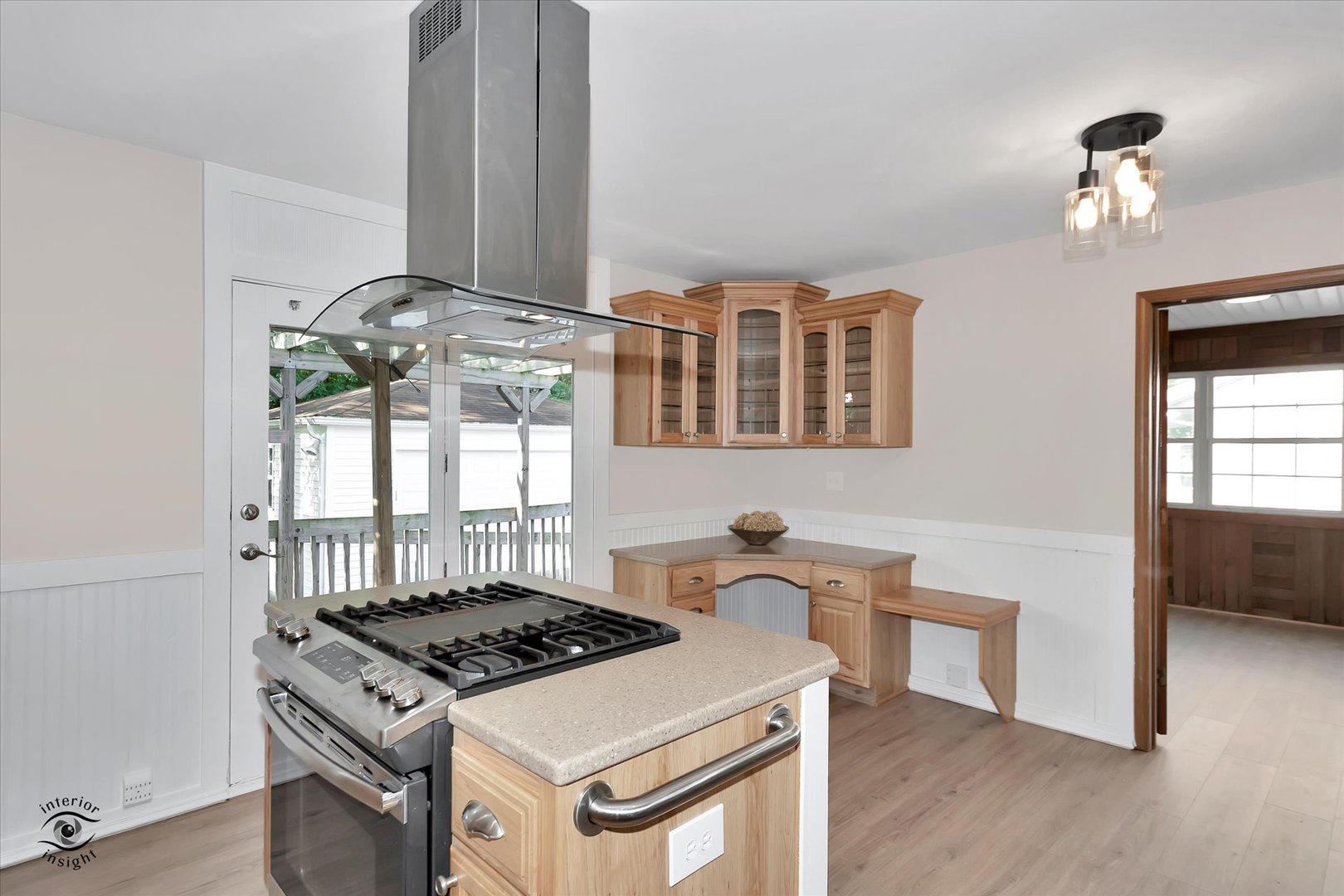 705 Union Avenue Romeoville, IL 60446 - Photo 8 of 26 a kitchen with a stove and wooden floor