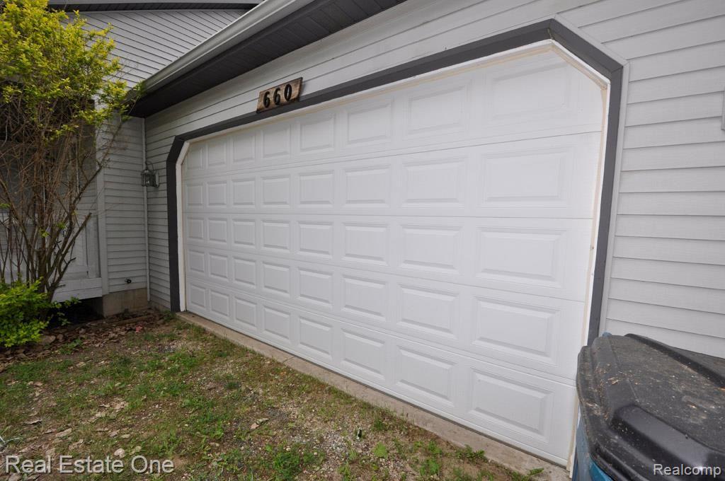 660 Dieterle Road Fowlerville, MI 48836 - Photo 28 of 35 Garage Door