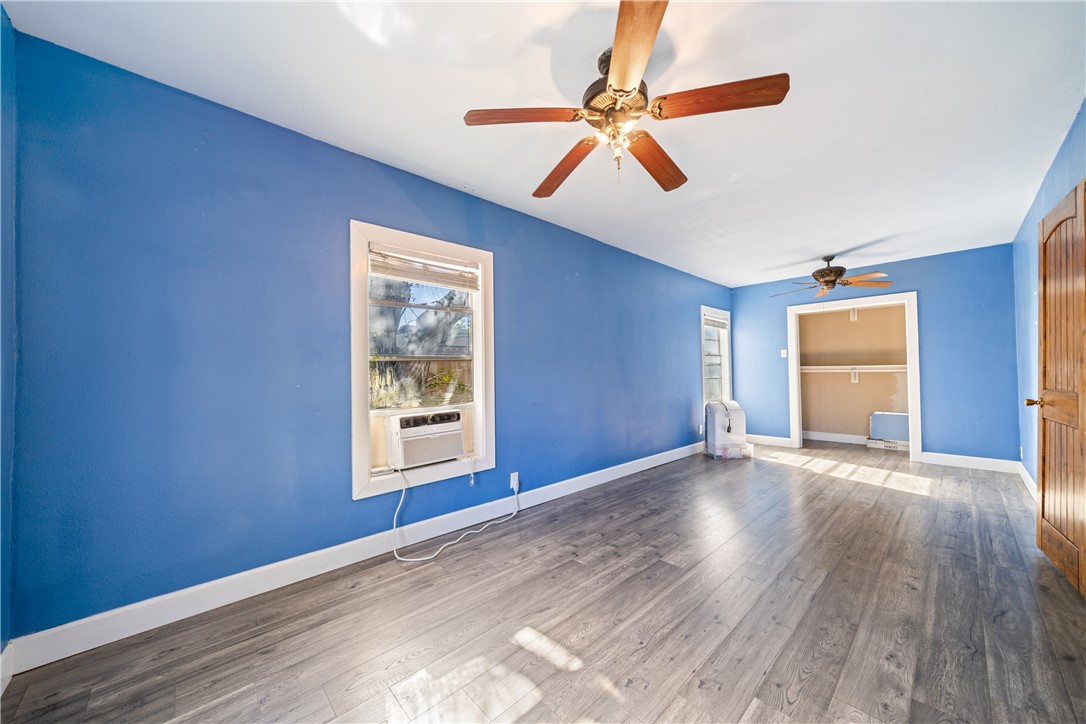 4117 Summit Drive Corpus Christi, TX 78418 - Photo 14 of 22 a view of an empty room with window and wooden floor