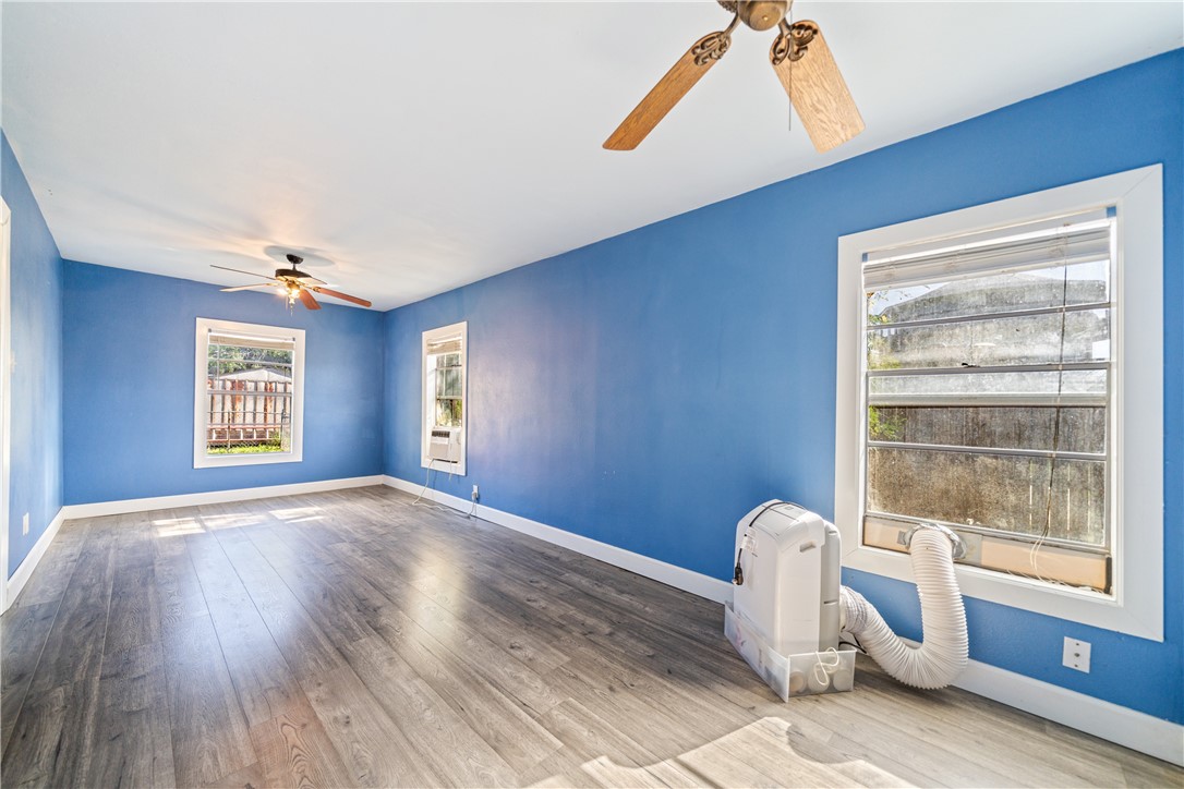 4117 Summit Drive Corpus Christi, TX 78418 - Photo 16 of 22 a view of empty room with wooden floor and fan