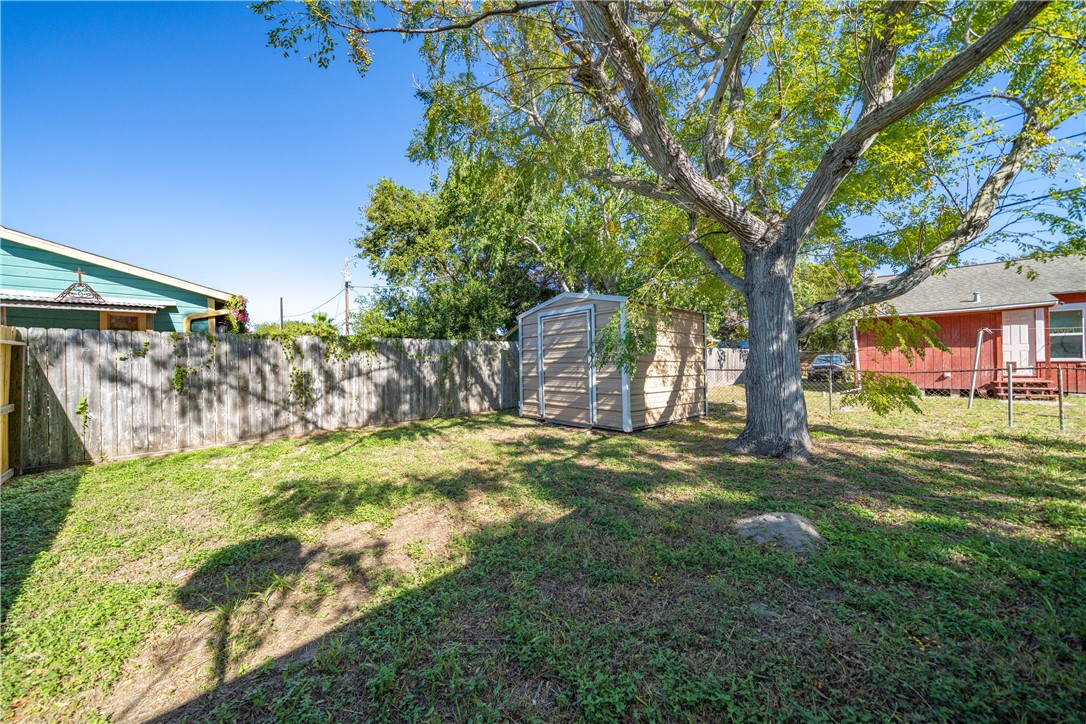 4117 Summit Drive Corpus Christi, TX 78418 - Photo 17 of 22 a view of a yard with a tree