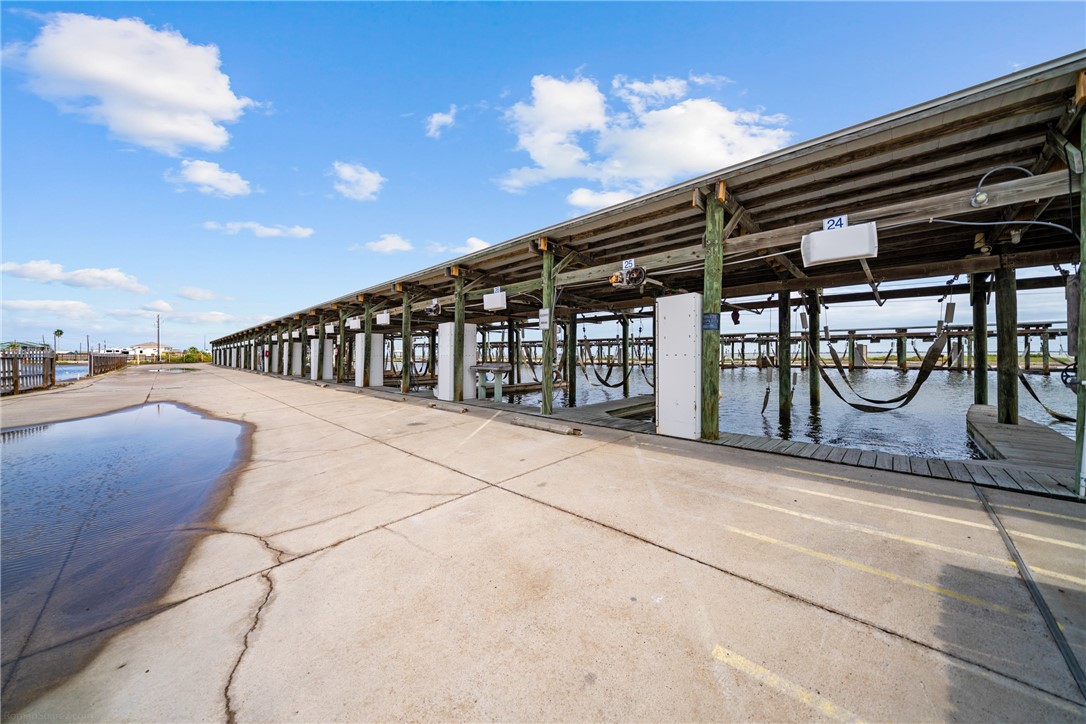 4117 Summit Drive Corpus Christi, TX 78418 - Photo 22 of 22 a view of a patio with a table and chairs