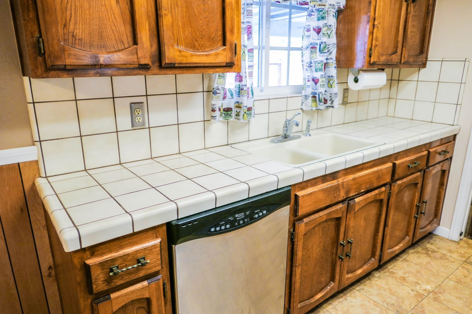 812 South Sunset Street Ridgecrest, CA 93555 - Photo 17 of 40 a kitchen with stainless steel appliances a sink and a cabinets