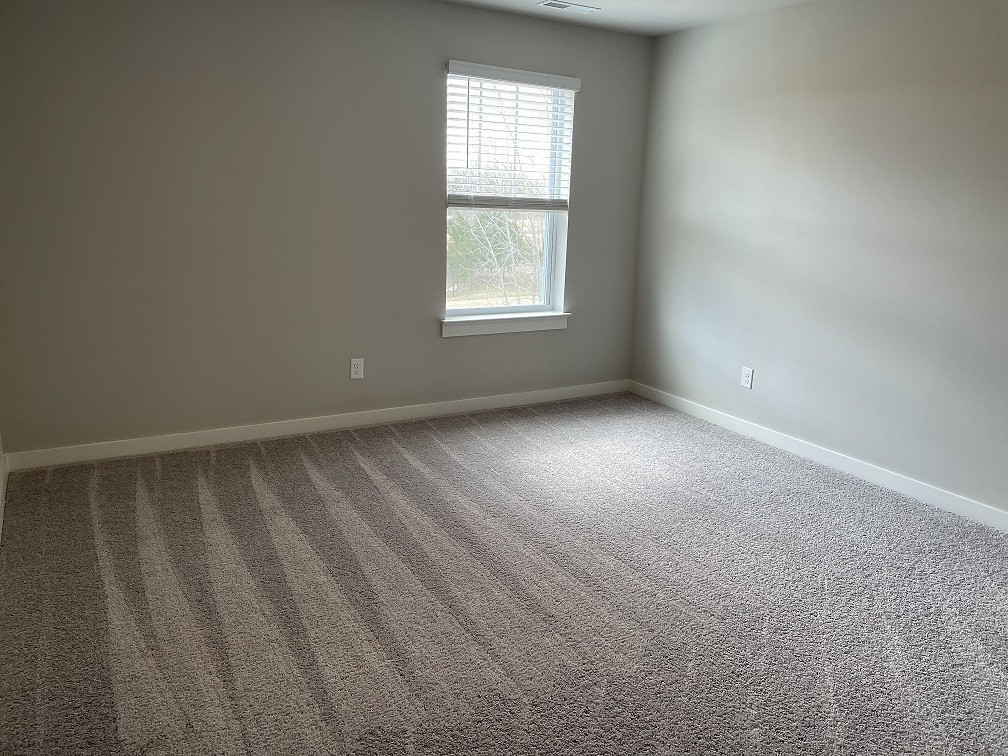 385 Casper Drive Spring Hill, TN 37174 - Photo 11 of 23 an empty room with windows