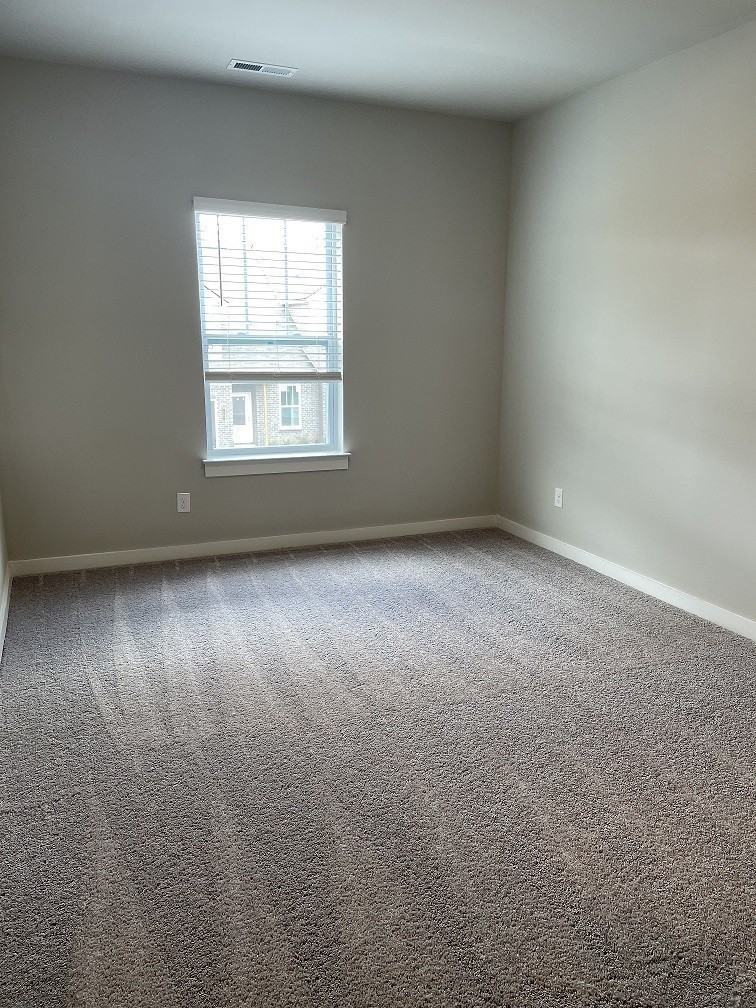 385 Casper Drive Spring Hill, TN 37174 - Photo 10 of 23 an empty room with a window