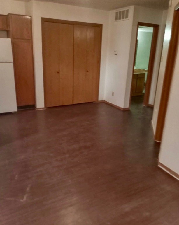 2800 Bull Run, Unit 707 Taylor, TX 76574 - Photo 6 of 6 an empty room with closet