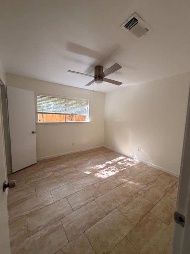 2807 Kenross Street Houston, TX 77043 - Photo 14 of 21 a view of empty room with window