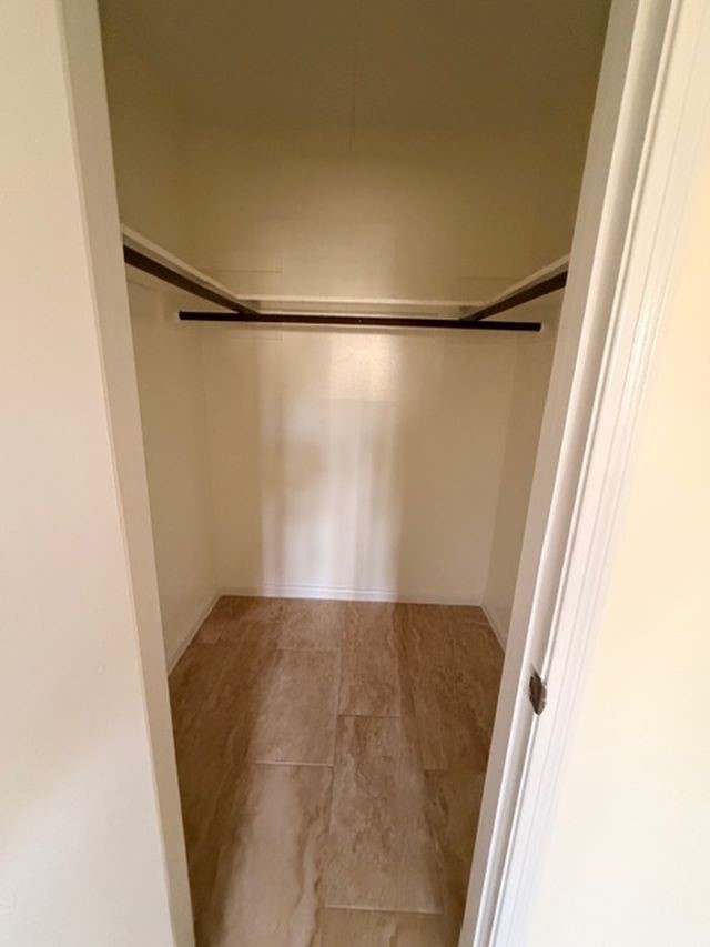 2807 Kenross Street Houston, TX 77043 - Photo 16 of 21 a view of bathroom with shower and a window