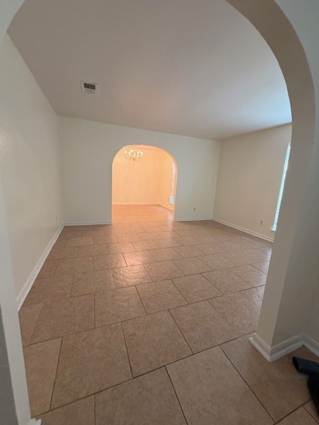 2807 Kenross Street Houston, TX 77043 - Photo 2 of 21 a view of a room with a small space and a window