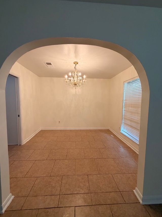 2807 Kenross Street Houston, TX 77043 - Photo 3 of 21 a view of an empty room with a window