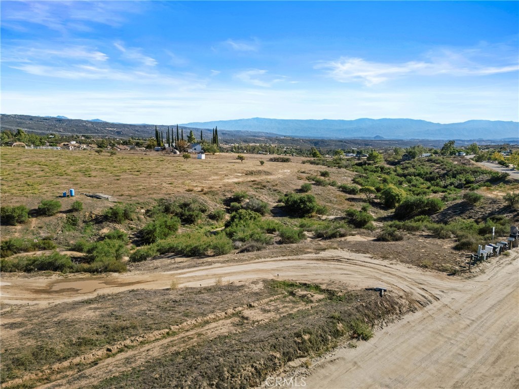 33945 Red Mountain Road Hemet, CA 92544 - Photo 26 of 30 a view of a lake with a yard