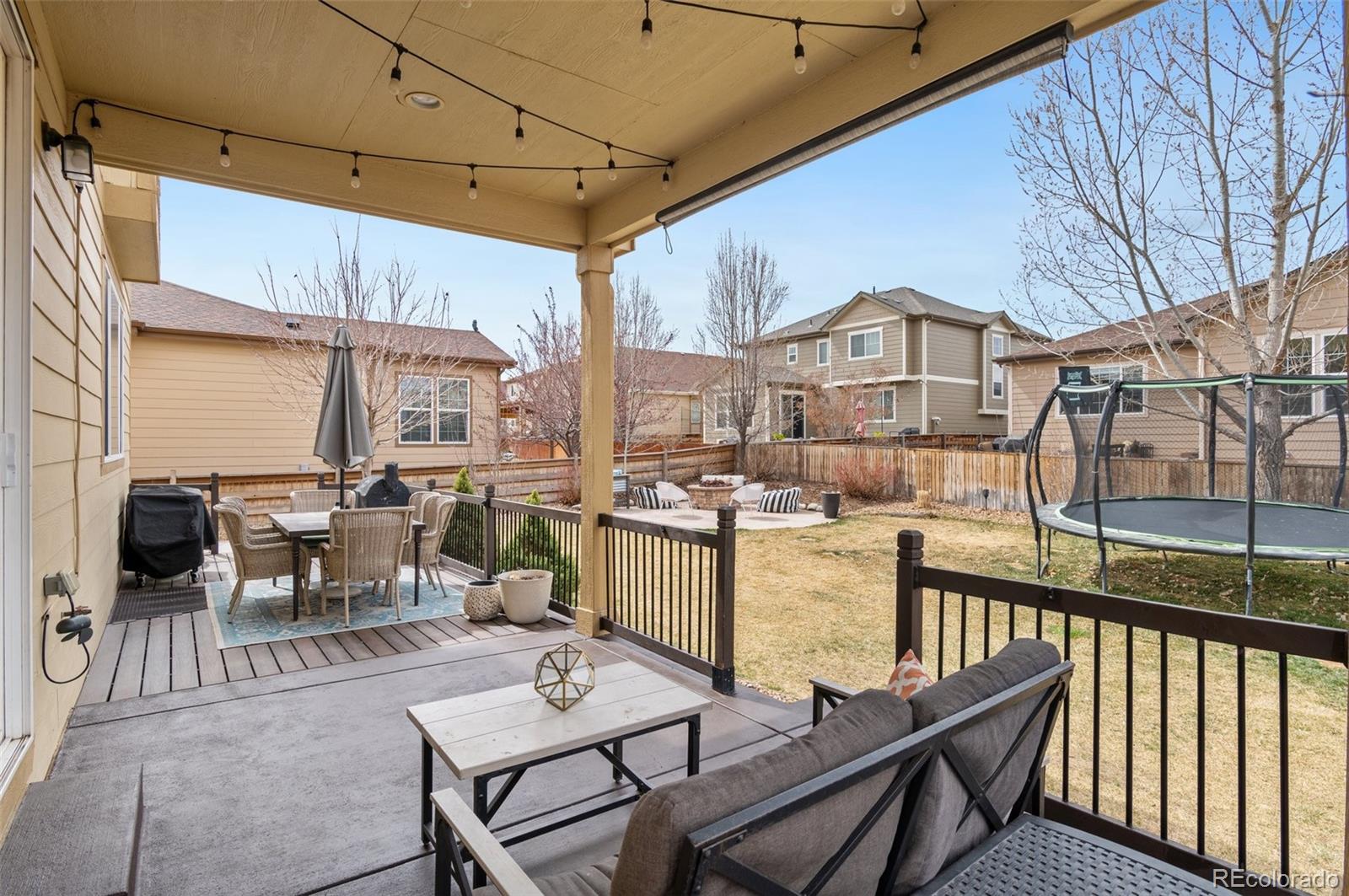 10995 Quintero Street Commerce City, CO 80022 - Photo 4 of 41 a view of a patio with couches table and chairs