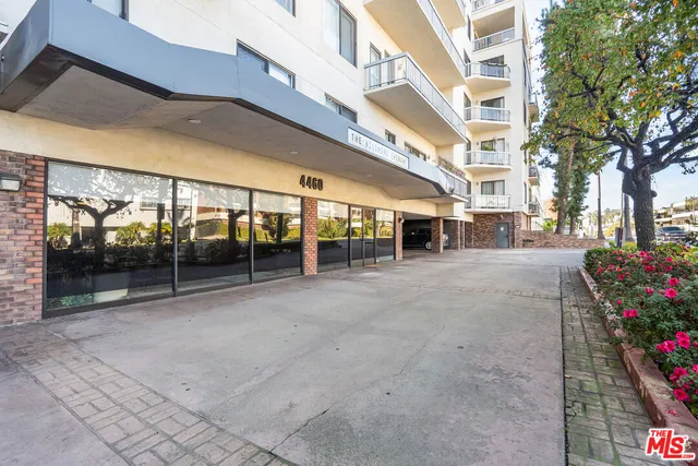 a view of a building with a street