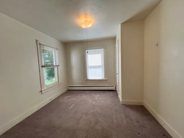 an empty room with windows