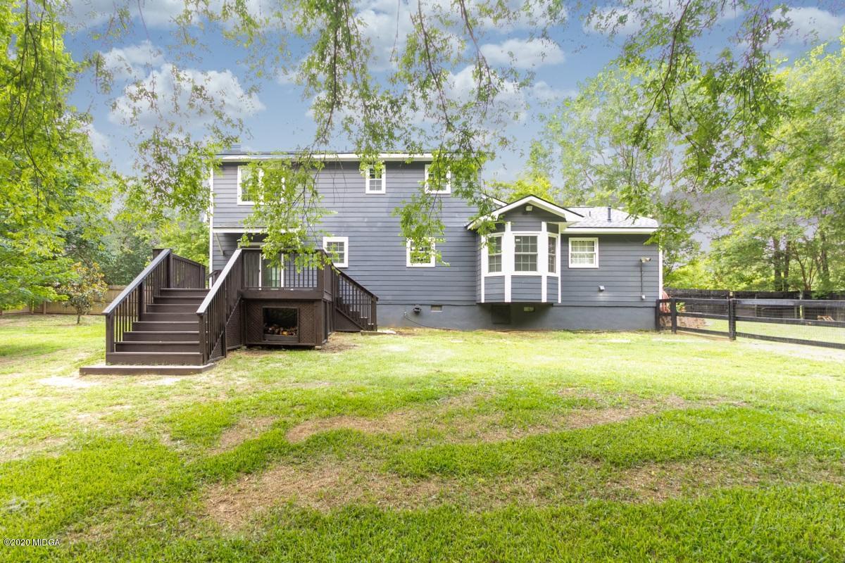 502 Stone Edge Road Macon, GA 31210 - Photo 22 of 22 front view of a house with a yard