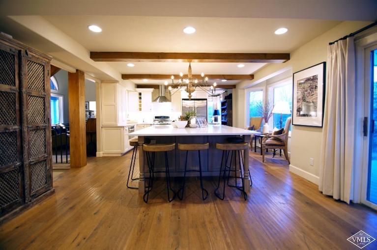 79 Cassidy Place Edwards, CO 81632 - Photo 3 of 8 a view of a dining room with furniture window and wooden floor