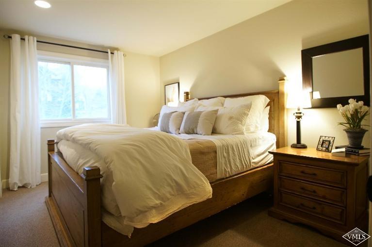 79 Cassidy Place Edwards, CO 81632 - Photo 6 of 8 a bedroom with a bed and a window