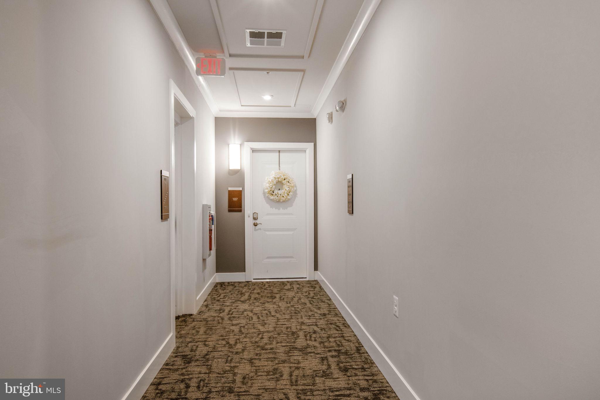 1669 Bandit Loop, Unit 107A Reston, VA 20190 - Photo 30 of 30 a bathroom with a sink and a shower