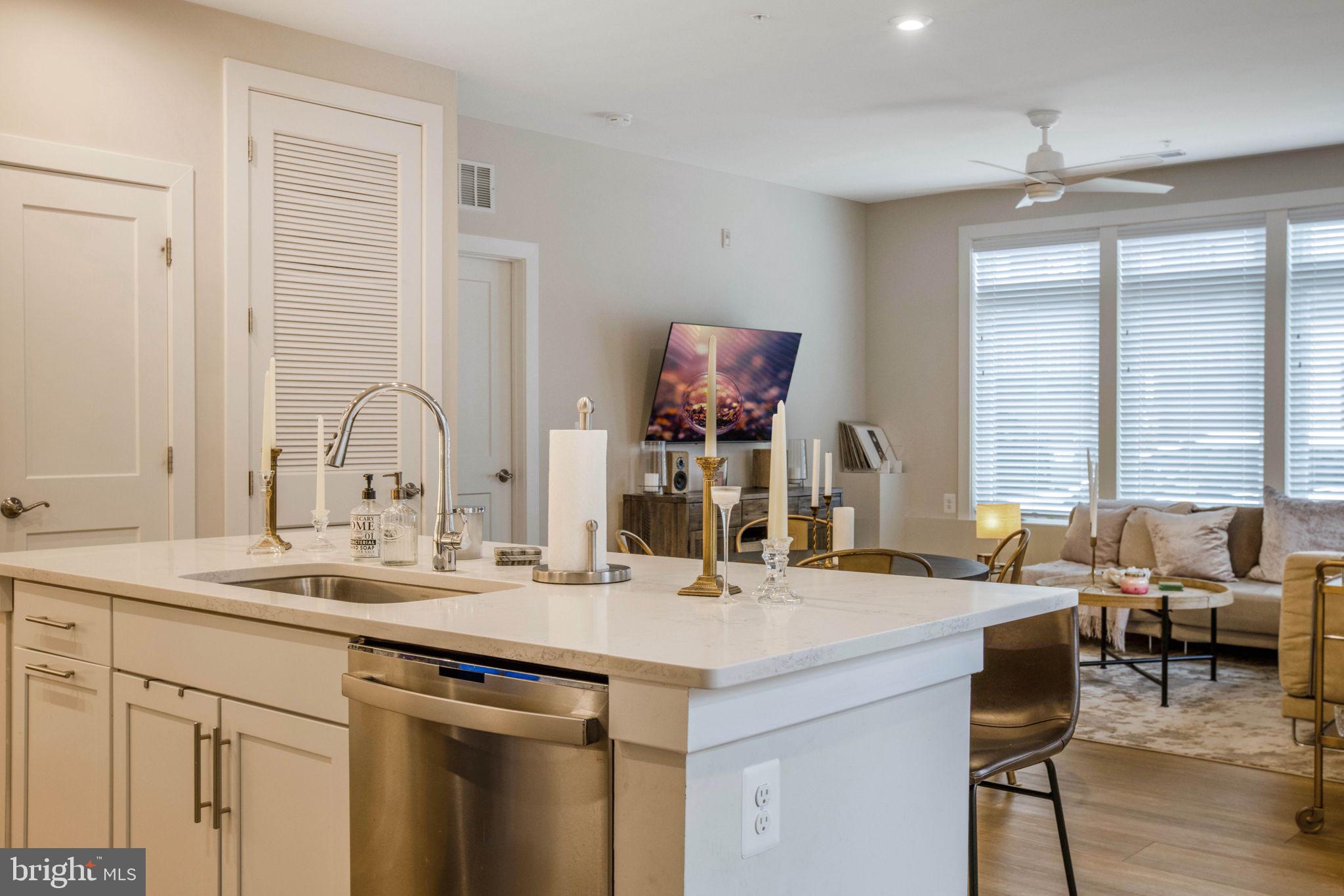 1669 Bandit Loop, Unit 107A Reston, VA 20190 - Photo 7 of 30 a bathroom with a sink and a mirror