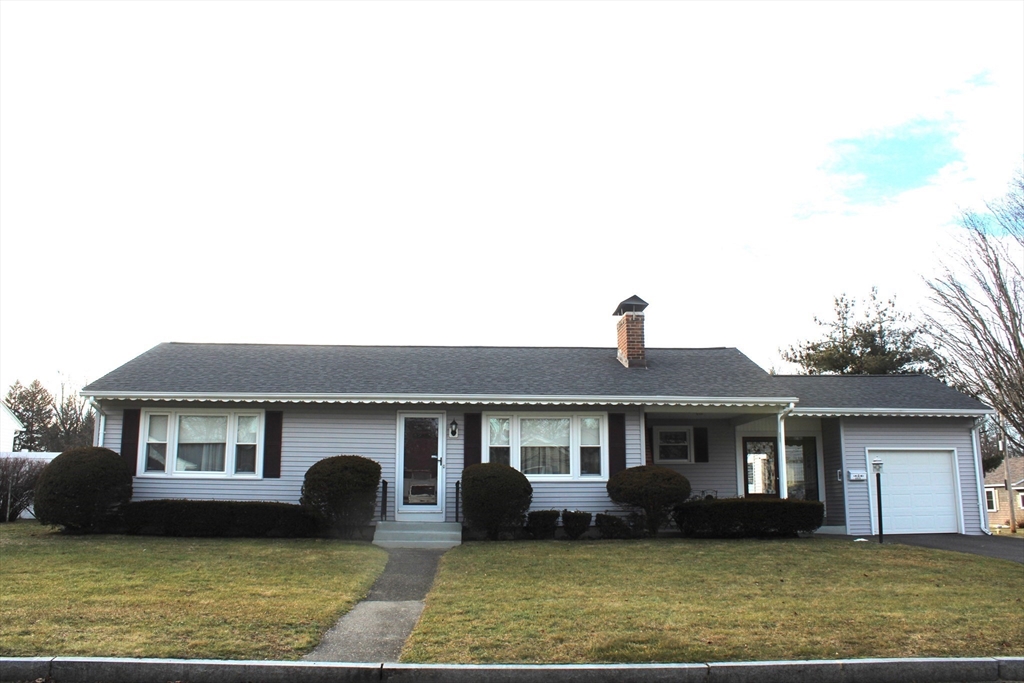24 Metzger Place Springfield, MA 01104 - Photo 1 of 35 a front view of a house with a yard