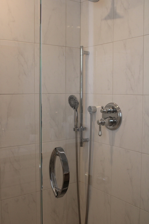 24 Metzger Place Springfield, MA 01104 - Photo 15 of 35 a bathroom with a shower