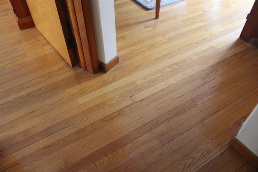 24 Metzger Place Springfield, MA 01104 - Photo 16 of 35 a view of a room with wooden floor and bench