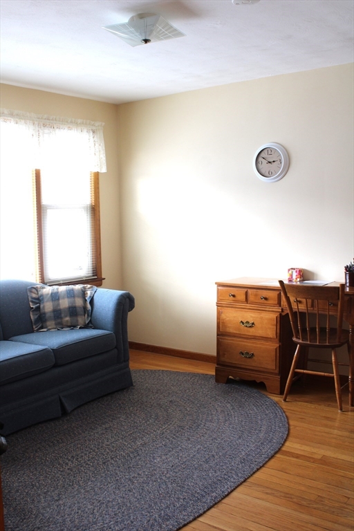 24 Metzger Place Springfield, MA 01104 - Photo 17 of 35 a room with furniture and a window