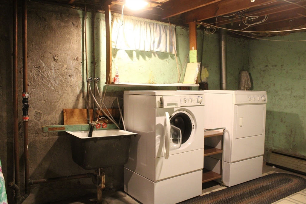 24 Metzger Place Springfield, MA 01104 - Photo 24 of 35 a view of a kitchen with washer and dryer