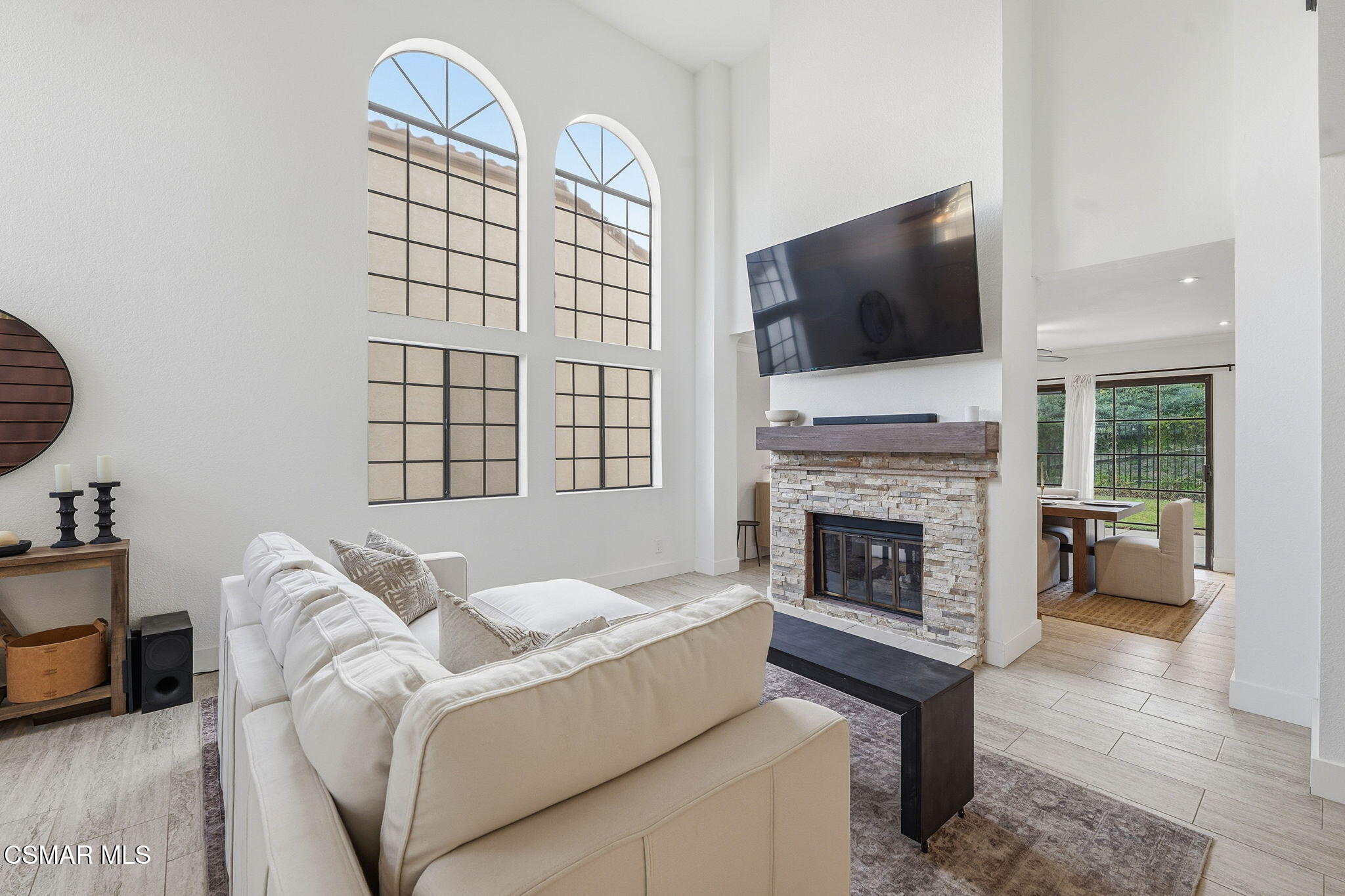 847 Links View Drive Simi Valley, CA 93065 - Photo 13 of 45 a living room with furniture a flat screen tv and a fireplace