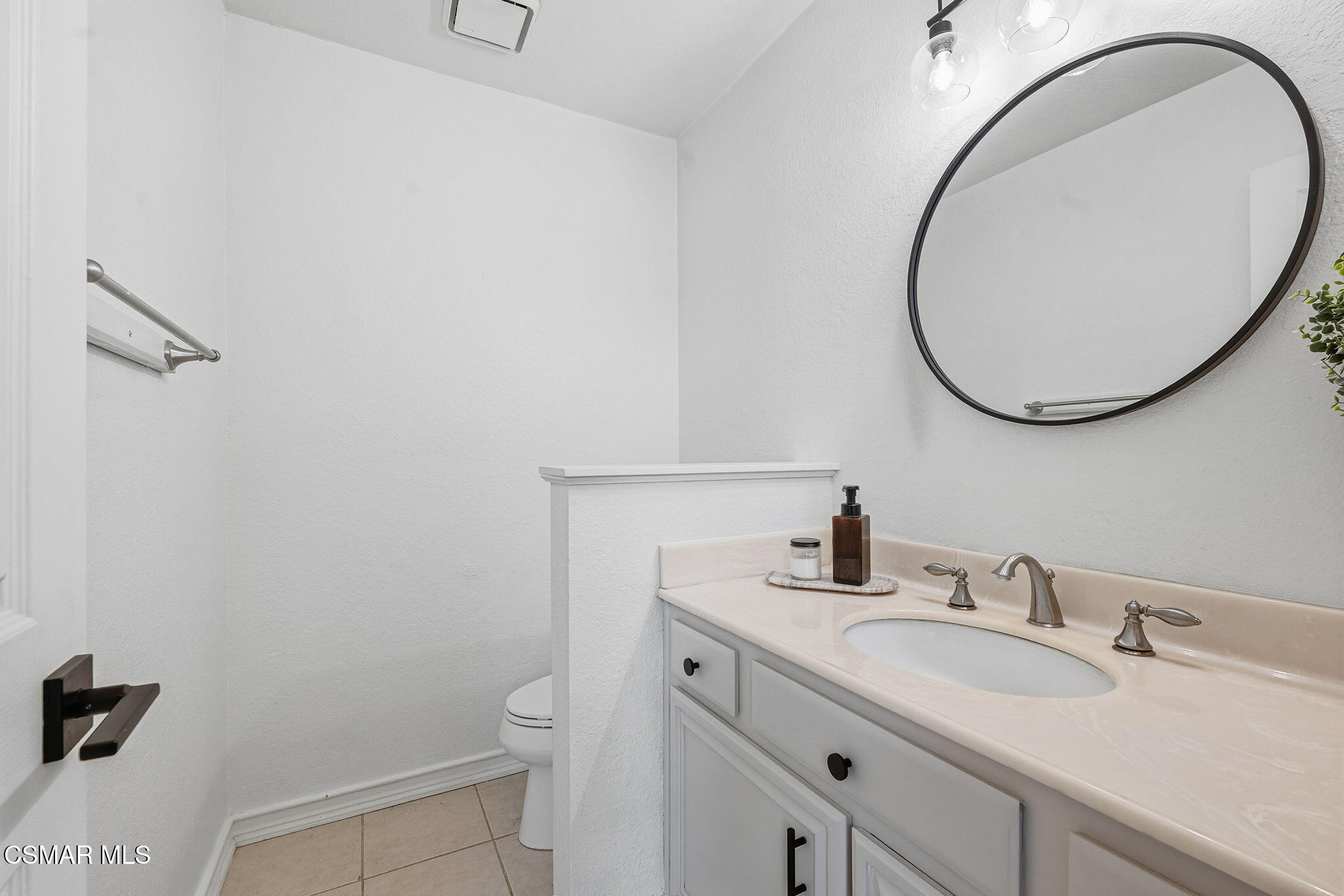 847 Links View Drive Simi Valley, CA 93065 - Photo 16 of 45 a bathroom with a sink and a mirror