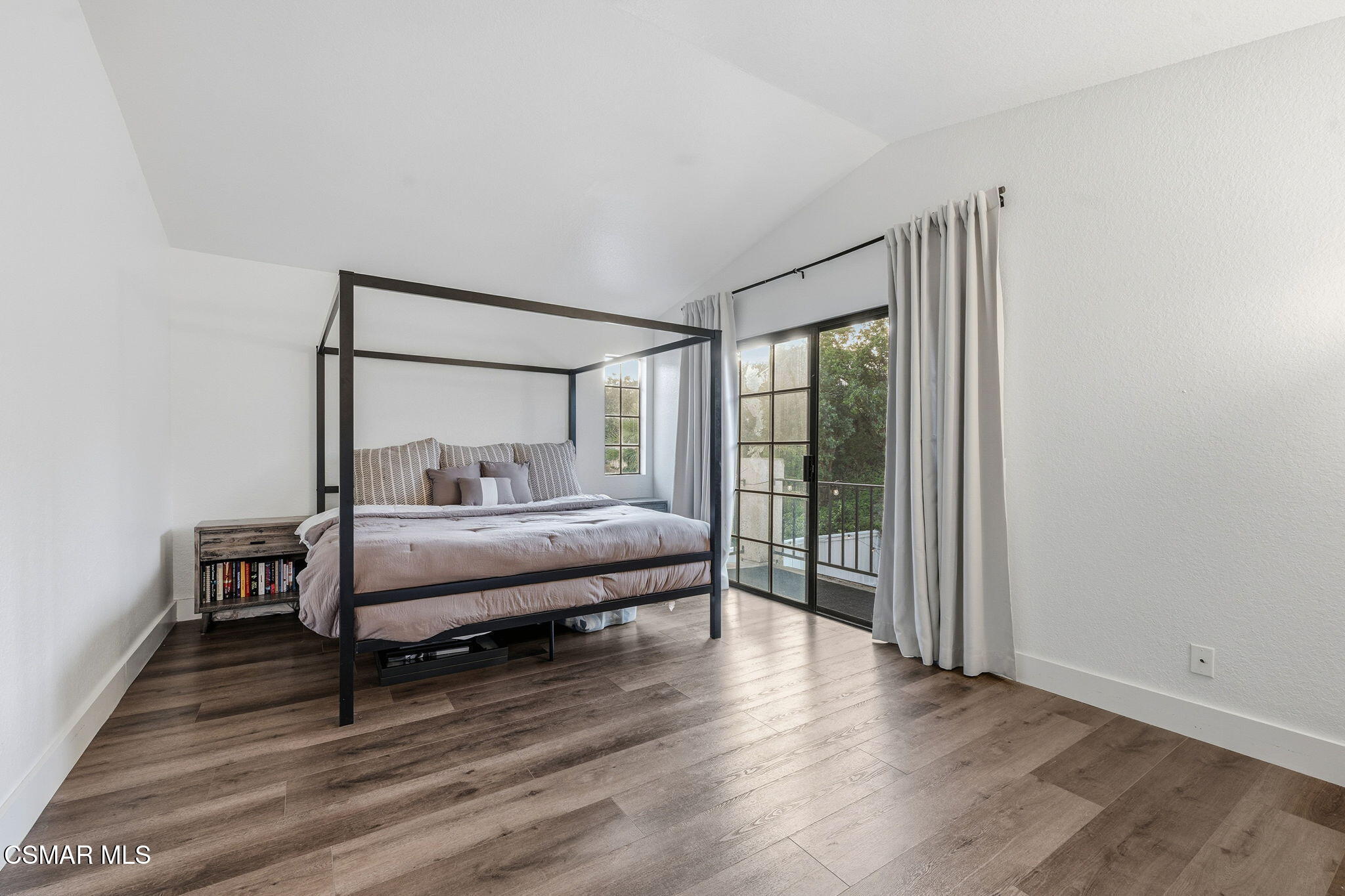 847 Links View Drive Simi Valley, CA 93065 - Photo 23 of 45 a bedroom with a bed and wooden floor