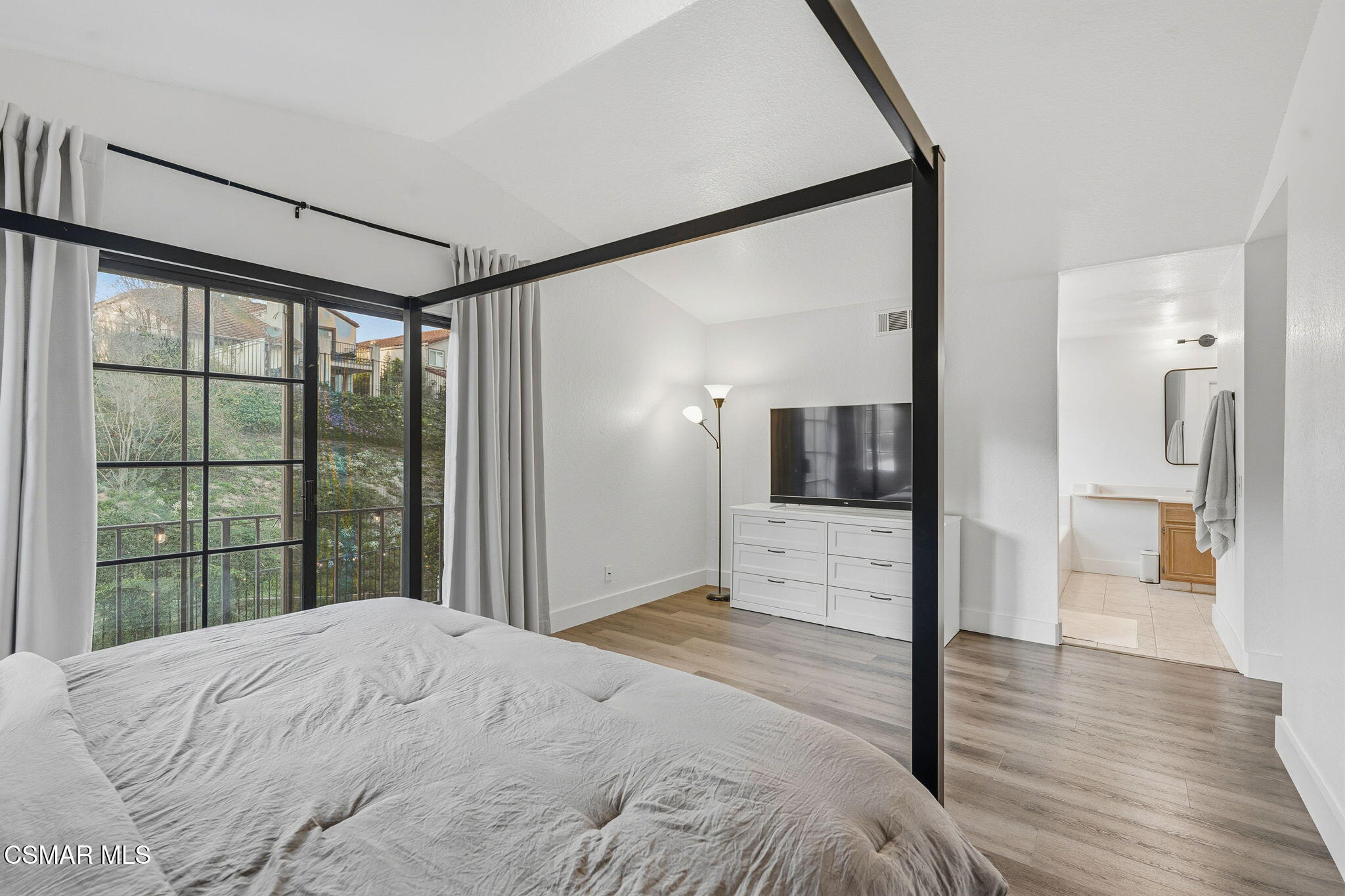 847 Links View Drive Simi Valley, CA 93065 - Photo 25 of 45 a view of a bedroom with wooden floor and a window
